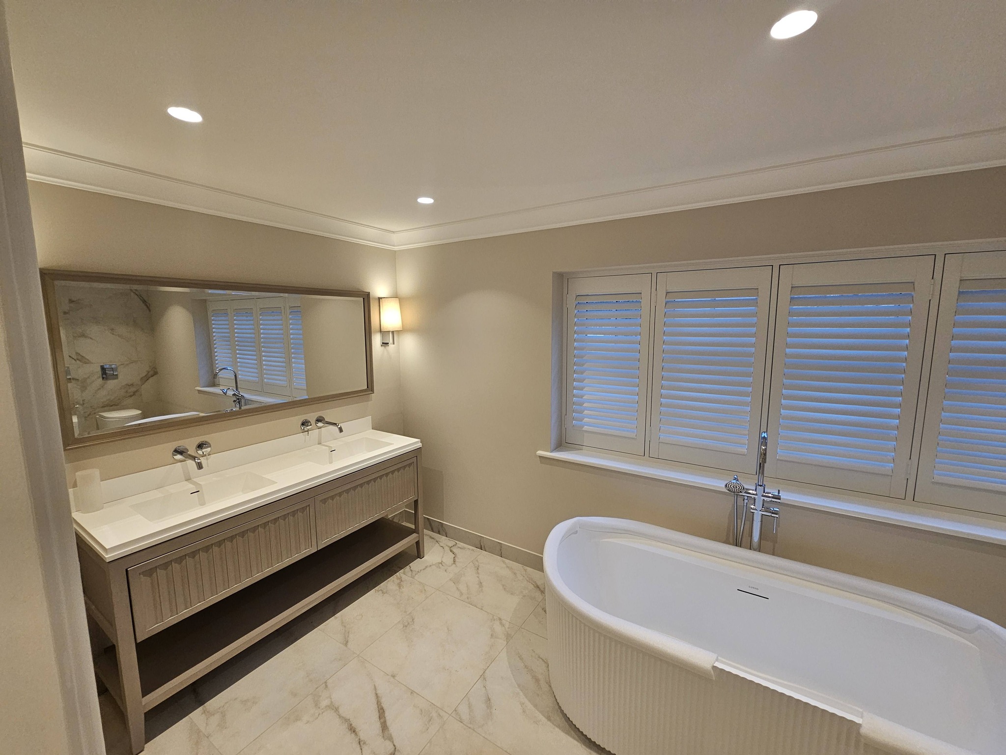 Premium bathroom decorating project with freestanding bath